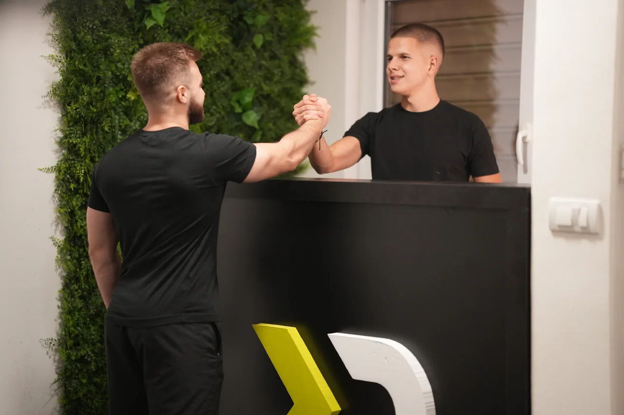 A coach welcomes a member at Dramićanin Academy.
